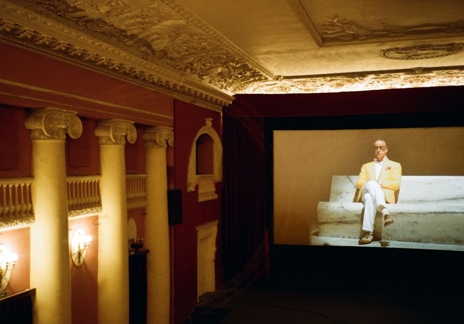 Classic theater interior in St. Petersburg with a film projection.